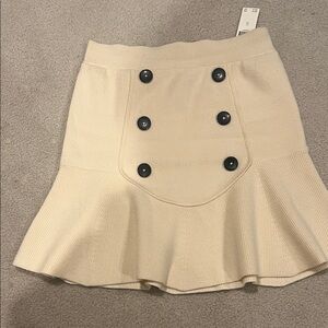 Maeve Cream Mini Skirt with Black buttons NWT XS but stretchy can fit small.